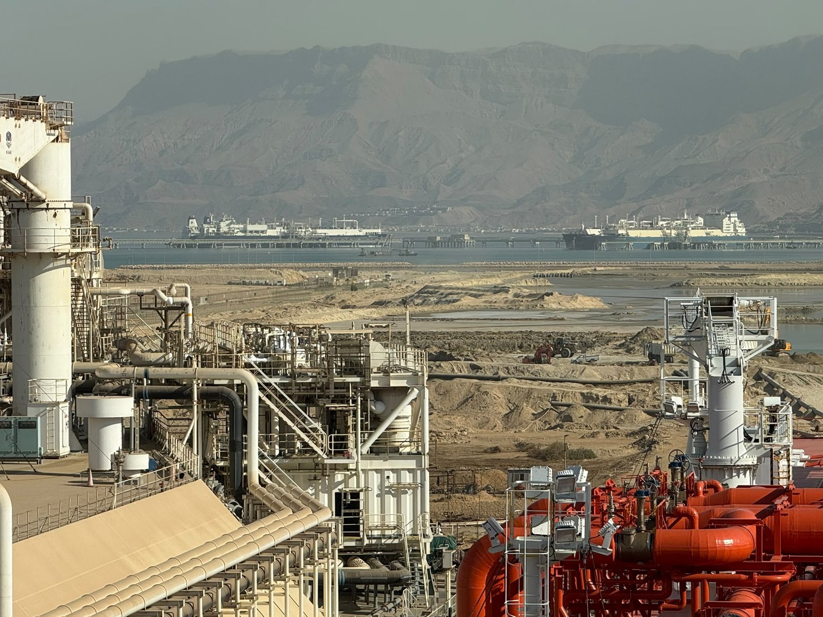 View across the Ain Sokhna LNG import terminal on the Gulf of Suez with the Egyptian mountains beyond