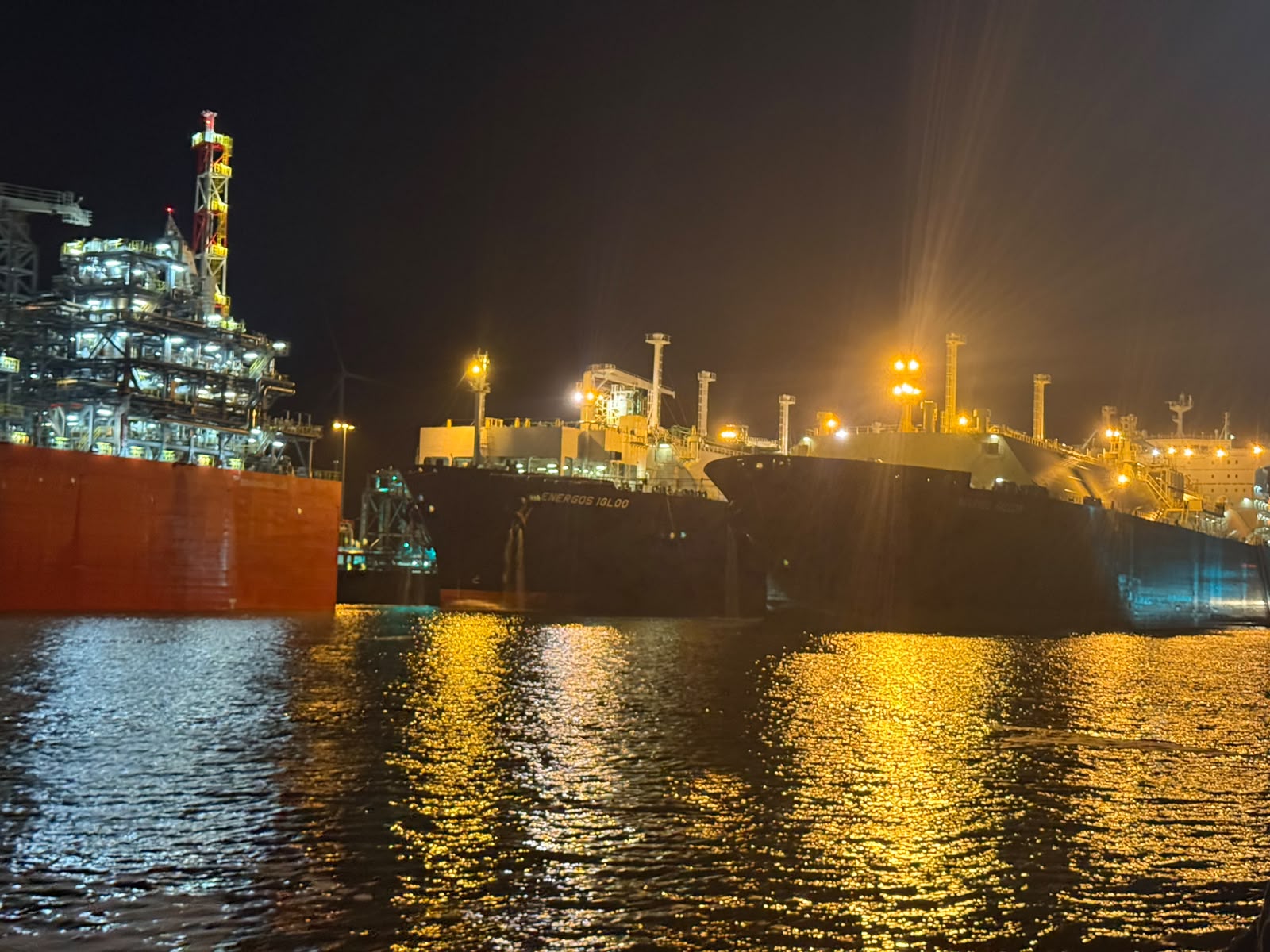 Night view of the LNG carrier moored alongside the FSRU Energos Igloo at Eemshaven