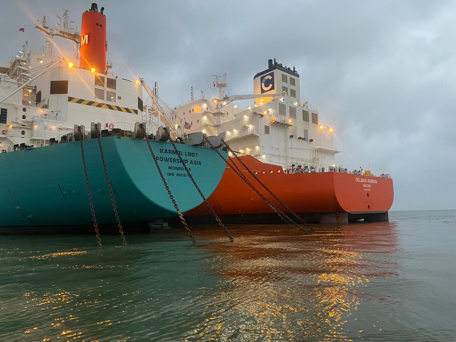LNG carriers moored side by side at dusk