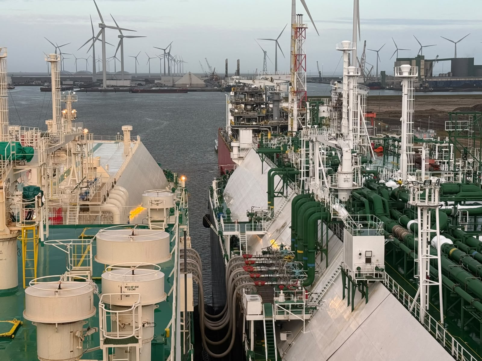 LNG carrier alongside the FSRU Energos Igloo at Eemshaven, Netherlands during an STS transfer