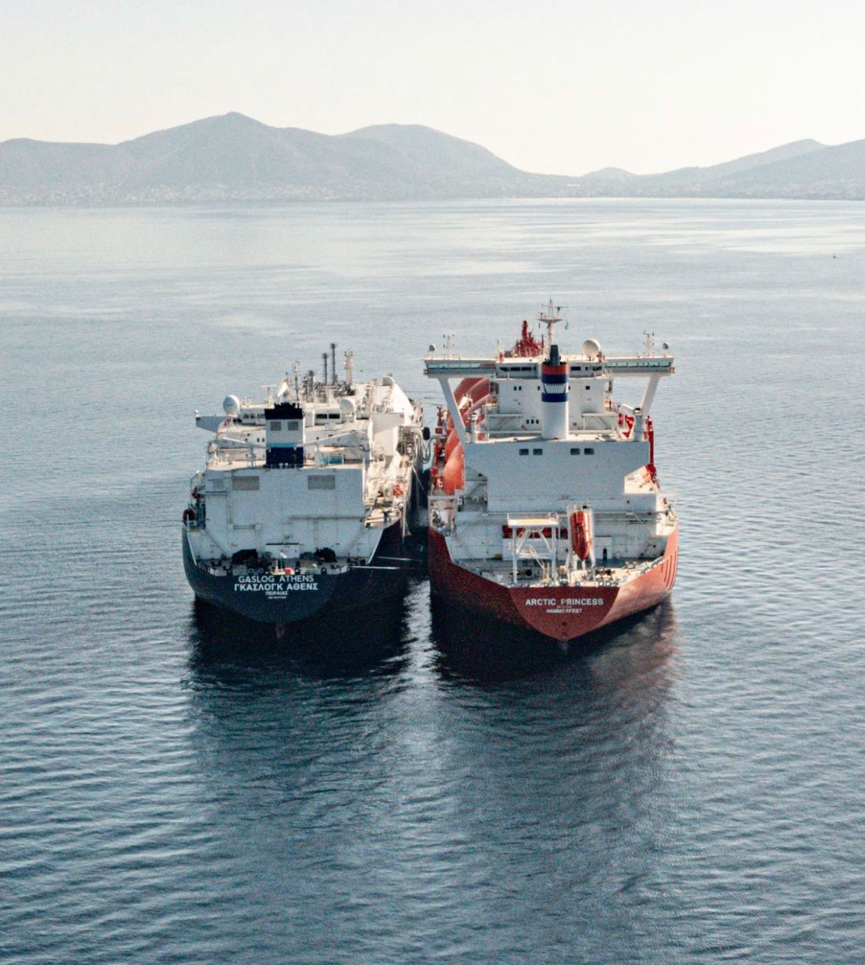 The LNG carrier Gaslog Athens moored alongside the shuttle tanker Arctic Princess during a ship-to-ship transfer